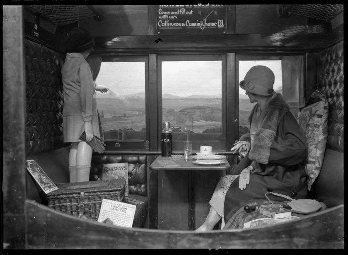 First-class train cabin with the view on the New Zealand planes