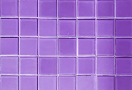Сolorful bright violet purple tiles square mosaictiles wall of the bathroom